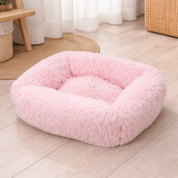 Lit moelleux pour petit chien rose